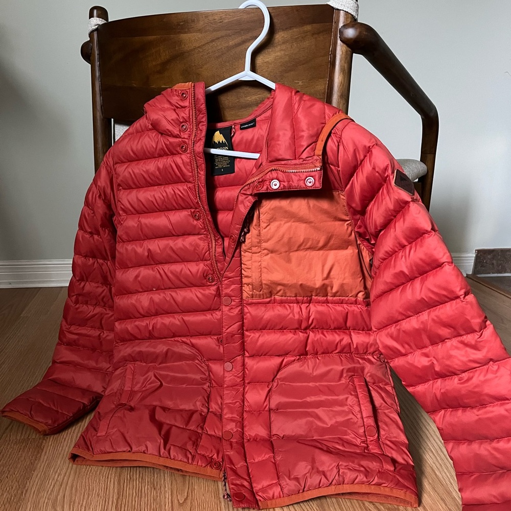Burton warm winter puffer jacket. Orange in colour. Size small.